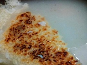 电饭煲糊饭的原因及解决方法（探索电饭煲糊饭背后的问题与解决方案）